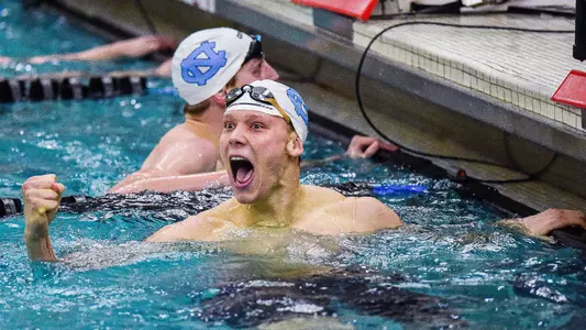 Junior Louis Dramm celebrates his time  during the South Carolina Invite at Carolina Natatorium in Columbia, SC Wednesday.