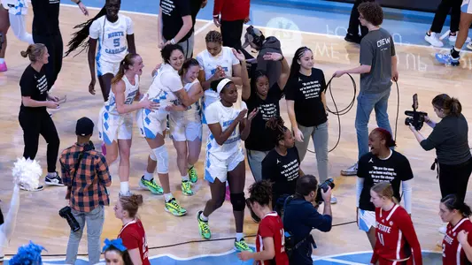 UNC celebrates their victory over NC State.