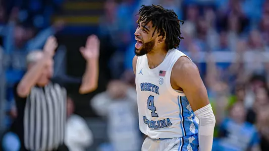 Senior RJ Davis reacts after making a three-point basket in their game against Notre Dame. The Tar Heels defeated the Fighting Irish 84-51.