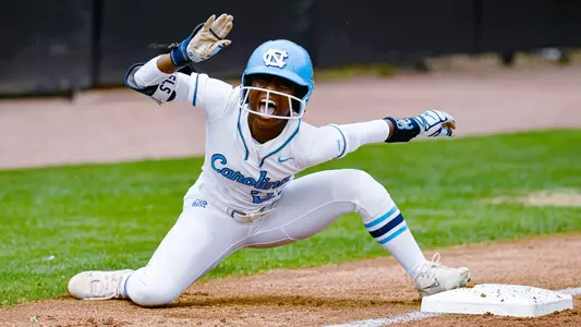 Senior Aneshia Jordan reacts after hitting her first career triple in their game against Louisville. The Tar Heels evened the series by winning the middle game 9-1.