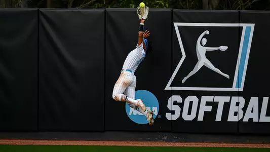 Freshman Sanaa Thompson makes a jumping catch in their game against Campbell. The Tar Heels won 6-0.