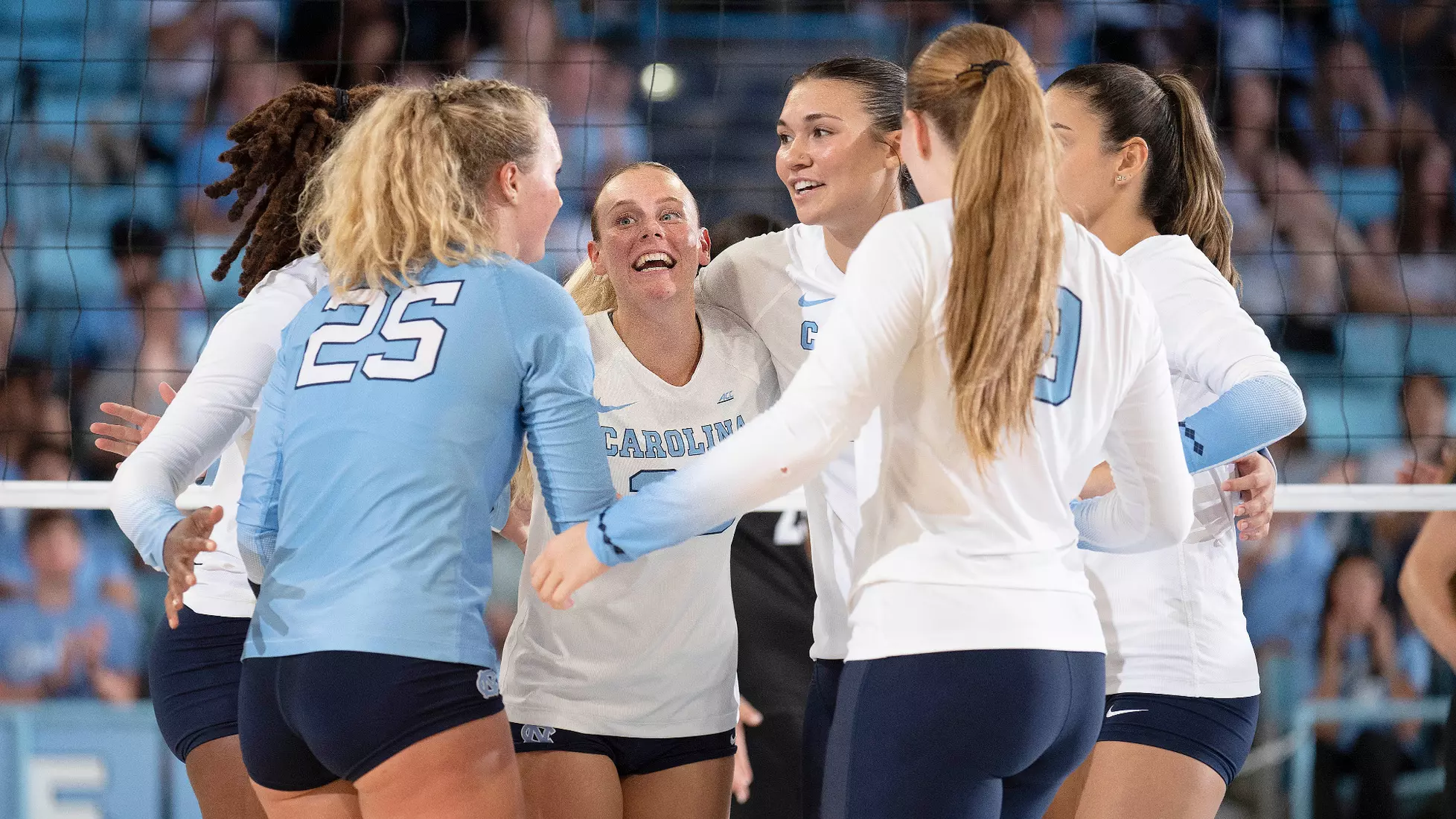 The Tar Heels huddle on the court.