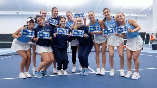 team celebration 
University of North Carolina Women's Tennis v Wisconsin 
ITA Tournament 
Cone-Kenfield Indoor Tennis Center 
Chapel Hill, NC 
Sunday, January 26, 2025
