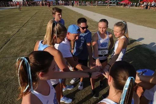 Women's Team Huddles At the Adidas XC Challenge