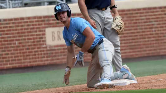 Carter French (18) after his three-run triple.