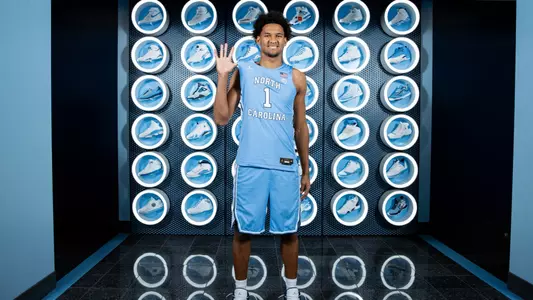 Maximo Adams recruiting photo shoe wall