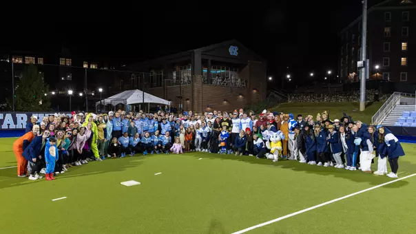 Carolina men's and women's lacrosse, baseball and softball teams hosted their fifth annual Heel-O-Ween Lax Ball event at Karen Shelton Stadium Tuesday night, uniting the student-athletes with children in the community to raise money for the UNC Children's Hospital.