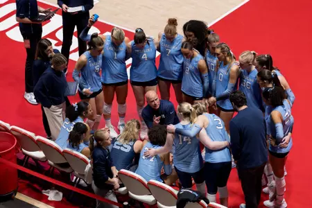 Volleyball Stands in the huddle against Wisconsin in the NCAA Tournament