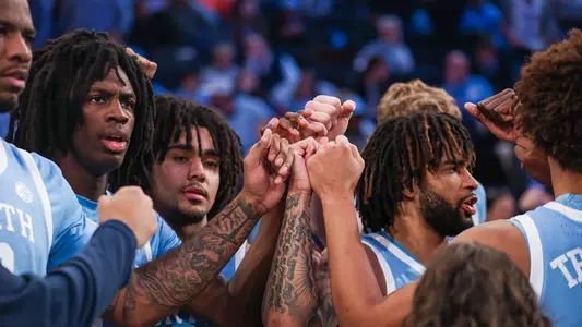 MBB huddle road game 2025