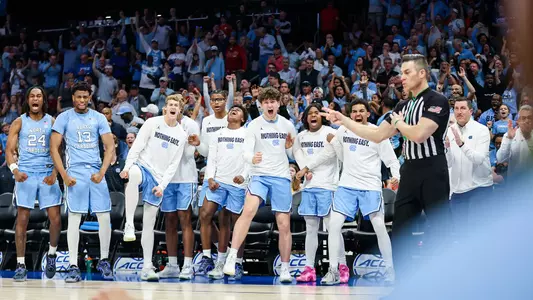 bench celebrates vs. Duke, ACC Tournament