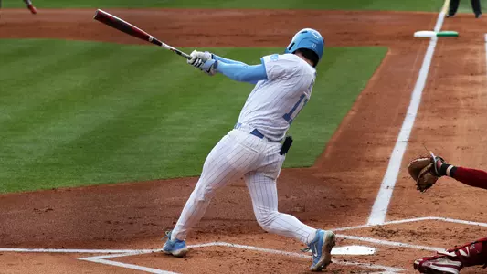 Tyson Bass (11) rips an RBI-single up the middle in the first.