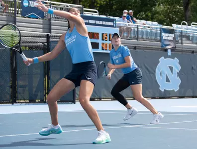 Freshman Alanis Hamilton, left, and junior Reese Brantmeier look to return a volley against South Carolina during the second round of the NCAA Tournament Saturday at Chewning Tennis Center.