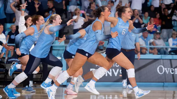 The UNC bench races on to the court as the team defeats Florida 3-0 Tuesday night at Carmichael Arena.