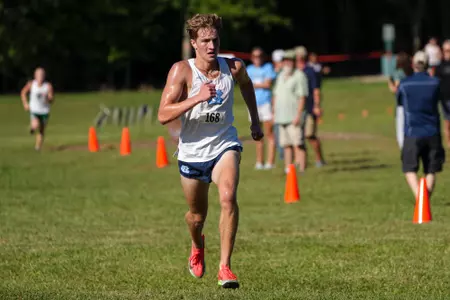 Henry Strand running at Charlotte Opener