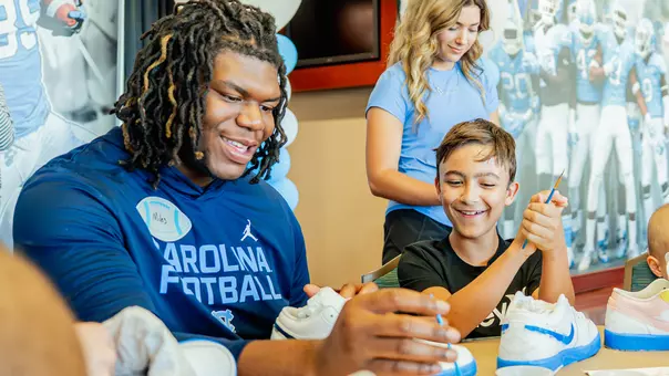 Kicks for Kids Shoe Painting with Pediatric Cancer Patients