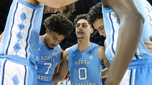 Kyan Evans, huddle at SMU