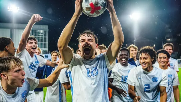 Senior Joschi Schelb celebrates with his teammates after defeating Notre Dame at Dorrance Field Saturday night.