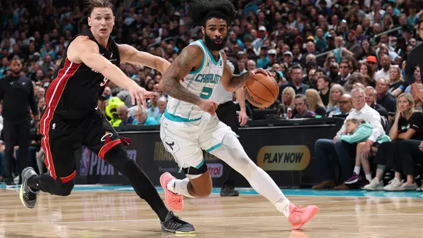 CHARLOTTE, NC - APRIL 14: Coby White #3 of the Charlotte Hornets dribbles the ball during the game against the Miami Heat during the Play-In Tournament on April 14, 2026 at Spectrum Center in Charlotte, North Carolina. NOTE TO USER: User expressly acknowledges and agrees that, by downloading and or using this photograph, User is consenting to the terms and conditions of the Getty Images License Agreement. Mandatory Copyright Notice: Copyright 2026 NBAE (Photo by Joe Murphy/NBAE via Getty Images)