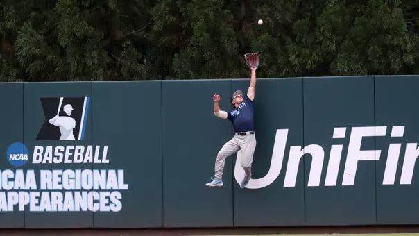 ...makes a fantastic catch in right-center...