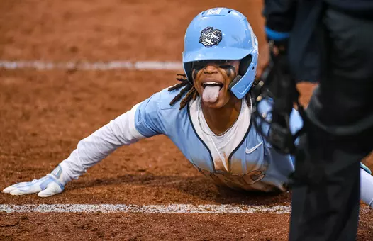 Junior Sanaa Thompson reacts to sliding home against Bryant at Anderson Stadium Friday.