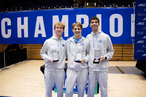 Bruk, Shamel and Wood Celebrate pose with their medals at ACC Championships