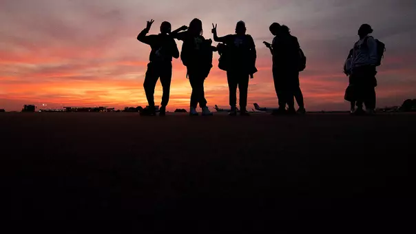 UNC women's basketball players and managers pose prior to boarding a flight at RDU Airport Wednesday. The team traveled to Duluth, GA to play in the ACC Tournament.