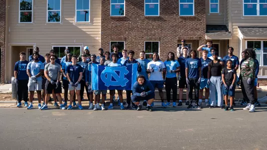 Carolina Football Volunteers with Habitat for Humanity Web Header