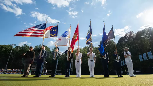 The UNC ROTC Color Guard stands on the Karen Shelton Stadium field during the playing of the national anthem prior to the team playing Old Dominion Friday afternoon.