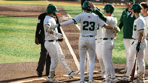 Dylan Koontz comes home after a grand slam