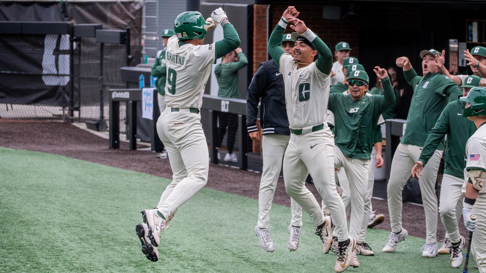 Alec DeMartino and Adrian Jimenez celebrate a home run