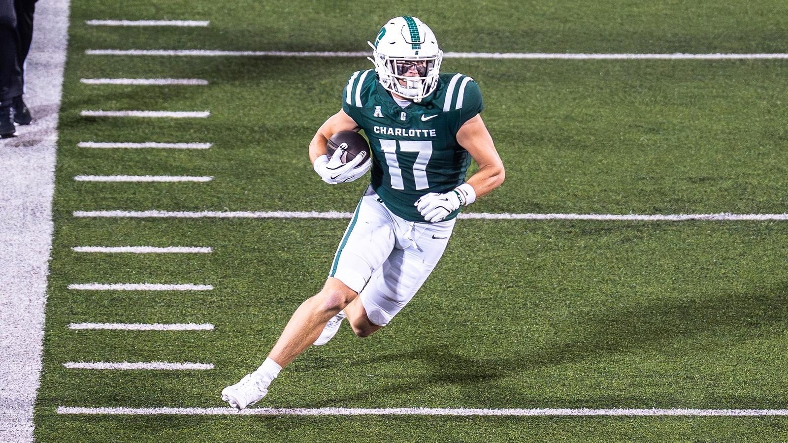 Gus McGee running with the ball
