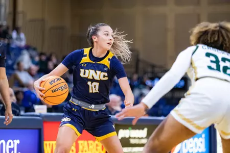 Hannah Simental dribbling away from a defender