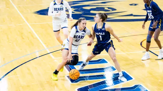 Hannah Simental driving to the basket