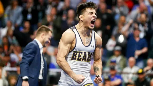 Andrew Alirez celebrates his 2023 National Championship win
