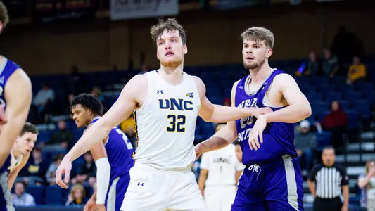 Theo Hughes going against a Weber defender