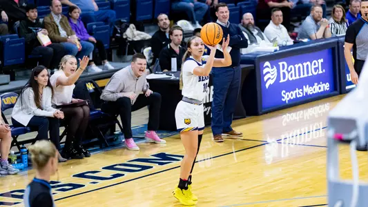 Hannah Simental shooting a three-pointer