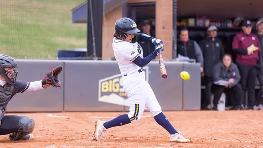 Abby Gaona swinging