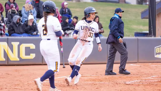 Baylie Kakallis scoring a run