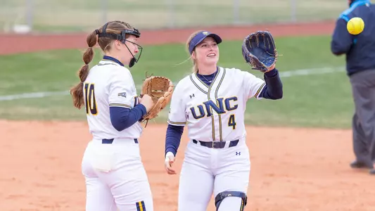 Alison Steinker and Erin Caviness after getting a Montana player out