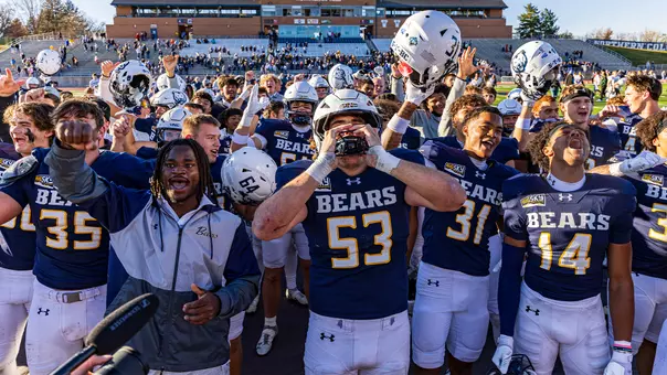FB Team Celebrating with Crowd
