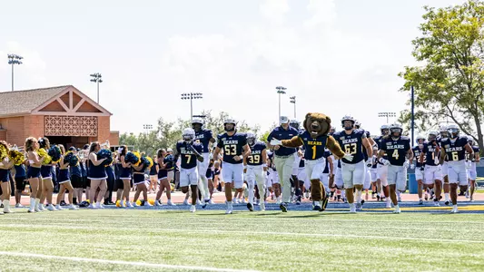 Football Running Out with Klawz