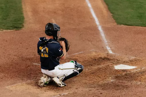 Minic behind the Plate