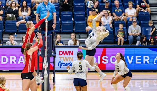 Maddie Rink with the Attack