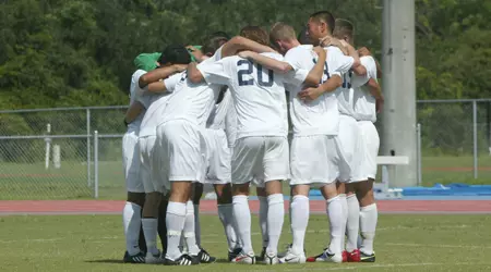 Soccer Team Huddle