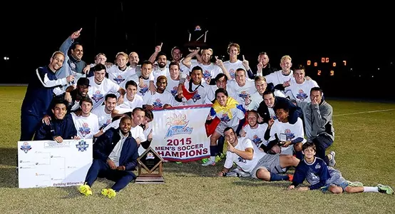 Men's soccer team with A-Sun Trophy