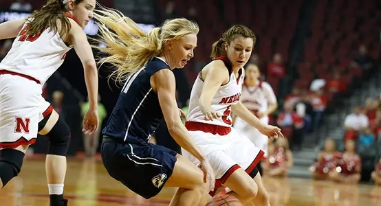 Madekivi surrounded by Cornhusker defenders