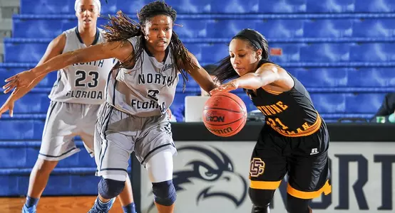 Sierra Shepherd dribbling down the court