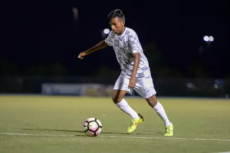 UNF men's soccer player get's ready to strike the ball