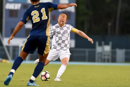 UNF men's soccer player gets ready to strike the ball