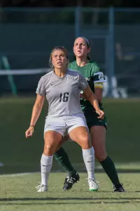 Katy Mixon waits for a ball to head